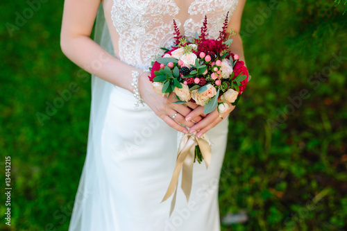 Wedding bouquet of roses with blackberries