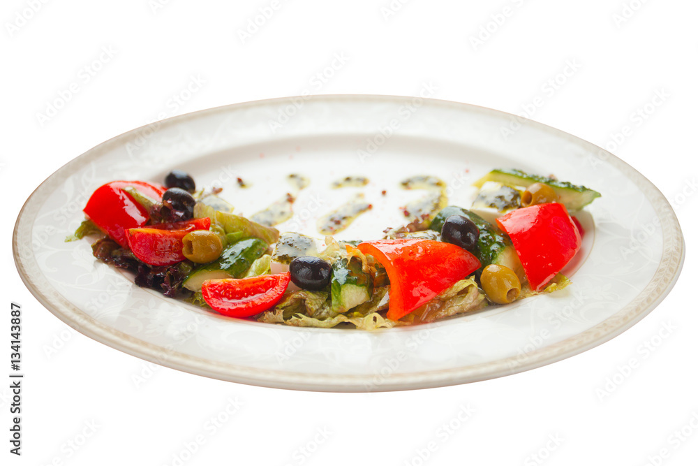 delicious greek salad on plate on white background delicious greek salad on plate on white background