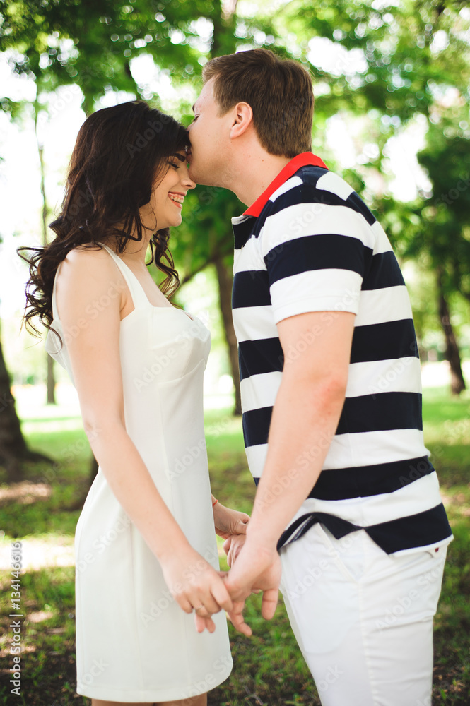 lovely happy couple at summer park lovely happy couple at summer park