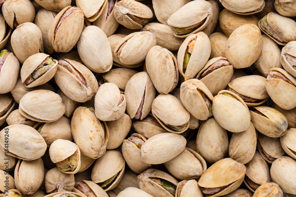 Roasted and salted pistachios in shell.