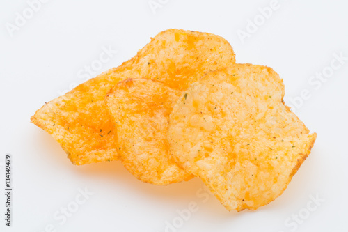 Crisps with paprica on a white background.