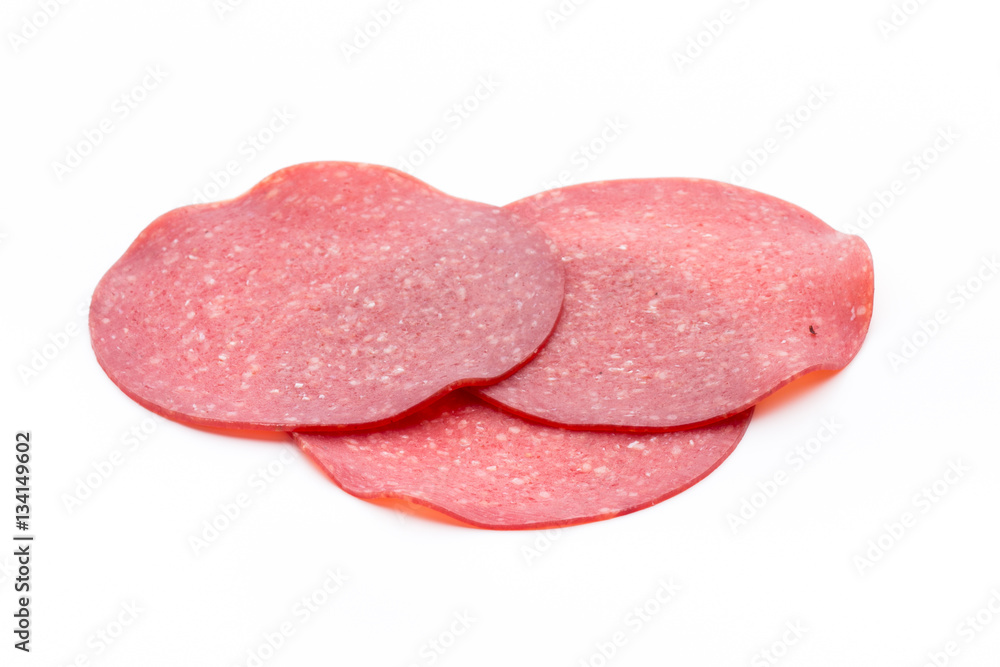 Salami smoked sausage one slice isolated on white background cut Salami smoked sausage one slice isolated on white background cut