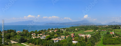 View of Lake Garda, summer landscape. Blue lake, mountayns Alps photo