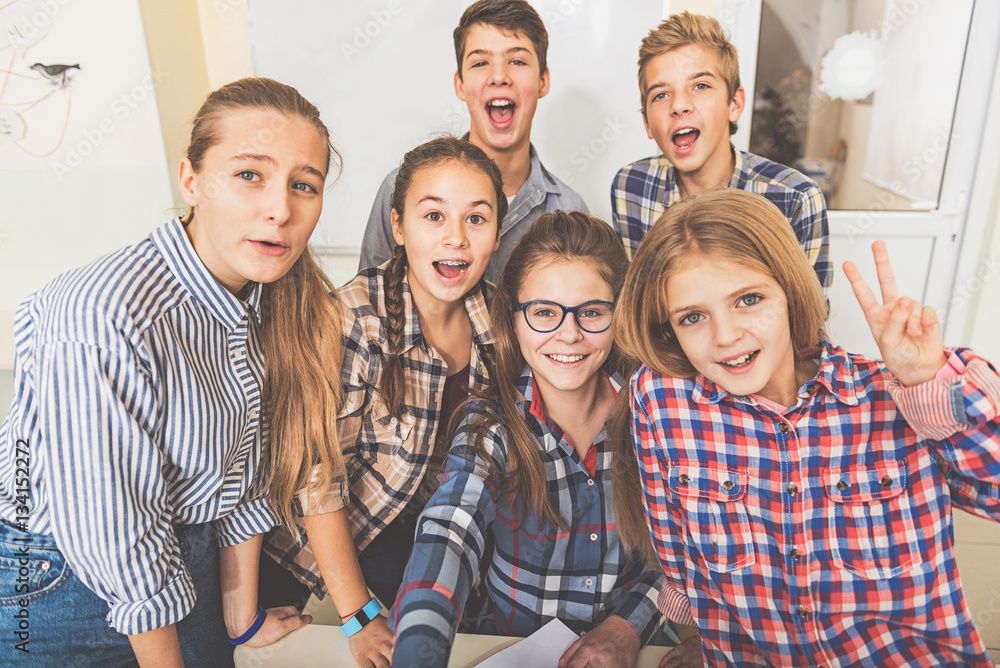 Funny pupils having fun together Funny pupils having fun together