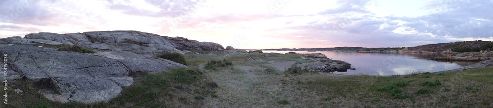 Sunset panorama with stony beach near Verdens end in Norway