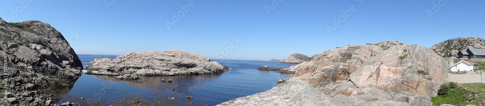Panorama of stony coast near Sjosanden beach and Mandal in Norway