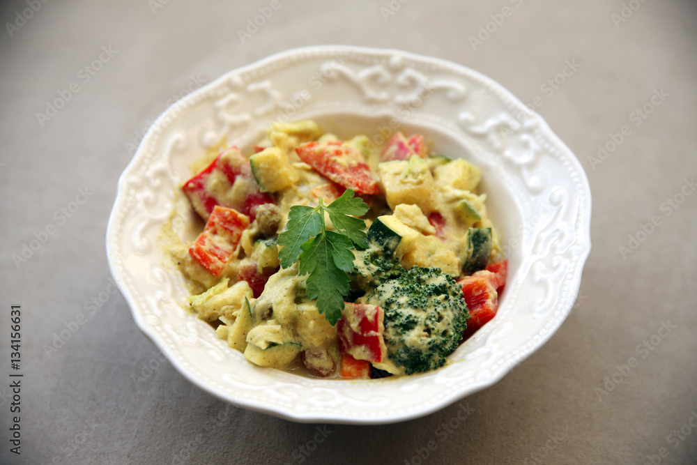 Healthy vegetable cucumber pepper broccoli salad with mayonnaise