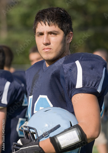 Football player on sideline