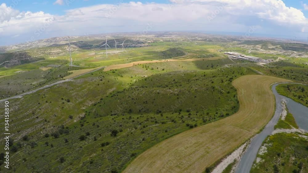 Amazing green landscape, wind turbines generating power, nature conservation Amazing green landscape, wind turbines generating power, nature conservation