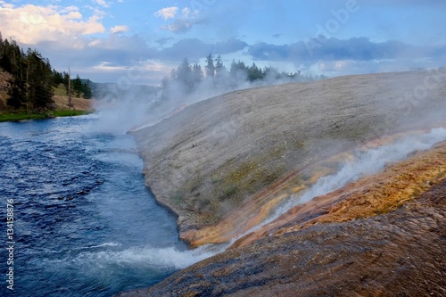 Steaming River of Yellowstone at sunset. Midway Geyser Basin. Yellowstone National Park. Jackson Hole. Wyoming. United States.