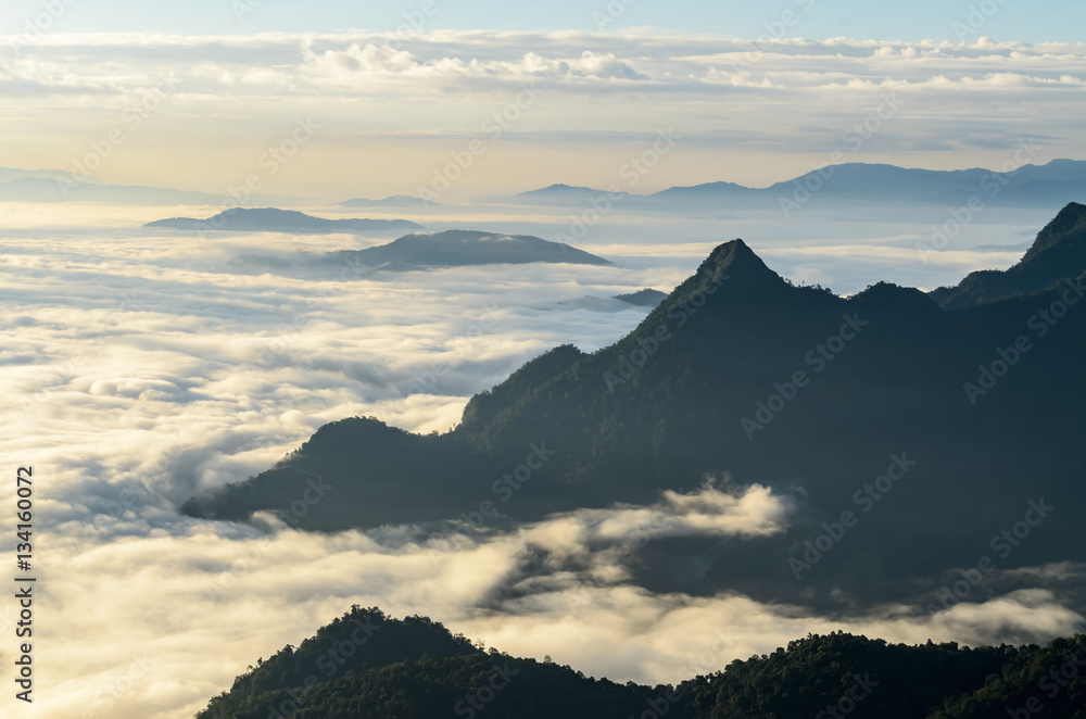 A view from hill of North Thailand in morning february and sunlight emanate on clouds flow