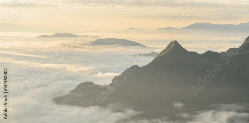 A view from hill of North Thailand in morning february and sunlight emanate on clouds flow