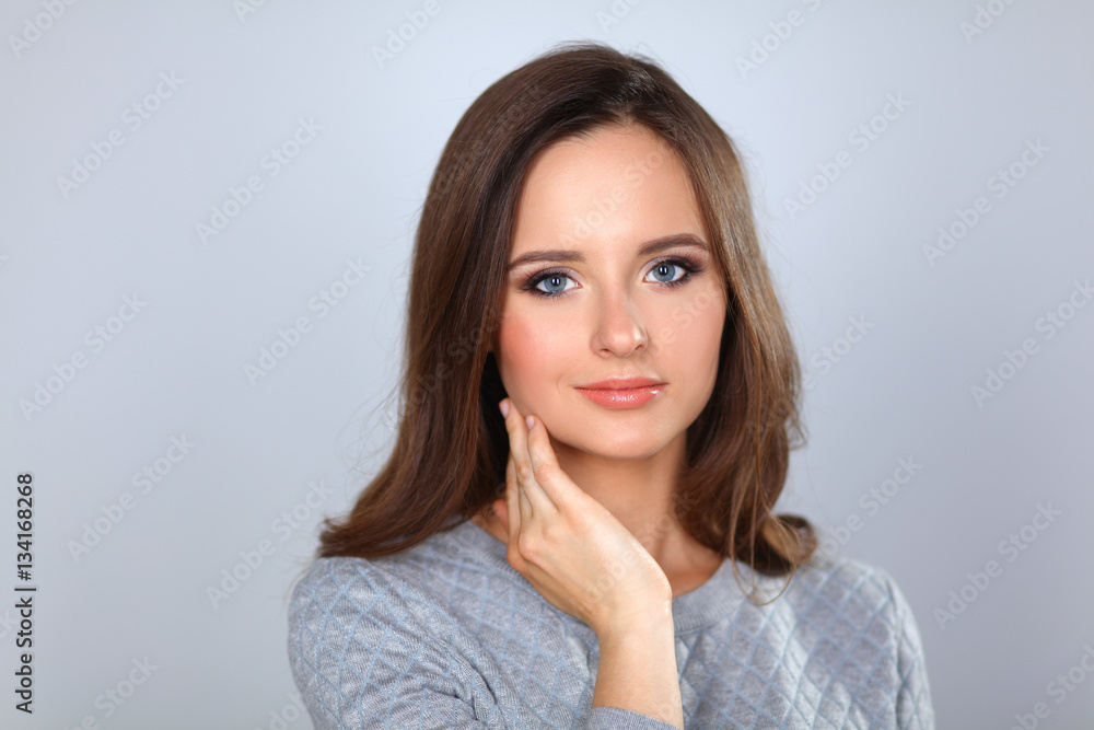 Portrait of an attractive fashionable young brunette woman Portrait of an attractive fashionable young brunette woman