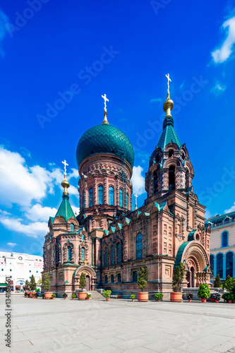 famous harbin sophia cathedral in blue sky from square photo