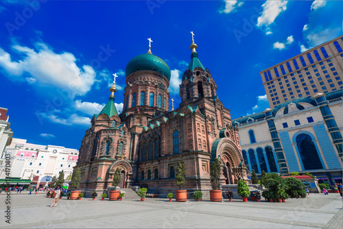 famous harbin sophia cathedral in blue sky from square photo