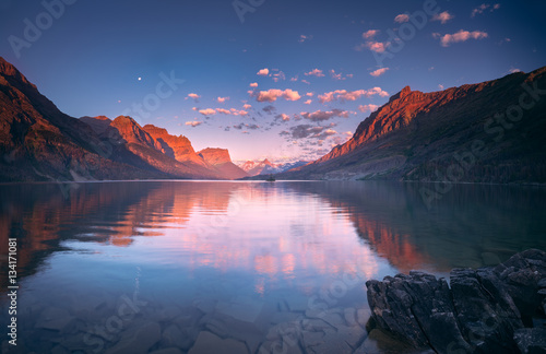 St Mary Lake in early morning with moon photo