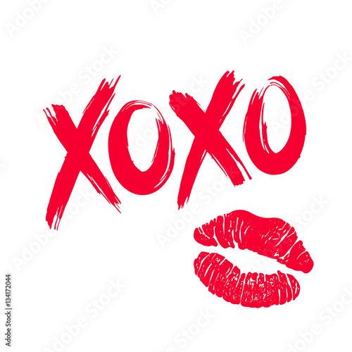 XOXO hugs and kisses brush lettering and lipstick kiss on a white background. Vector. photo