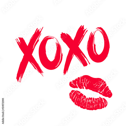 XOXO hugs and kisses brush lettering and lipstick kiss on a white background. Vector.