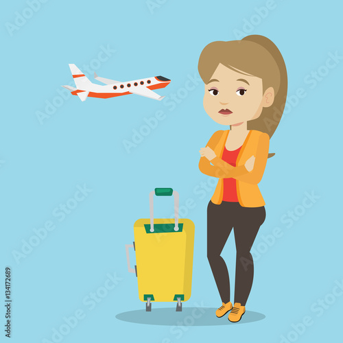 Young woman suffering from fear of flying.