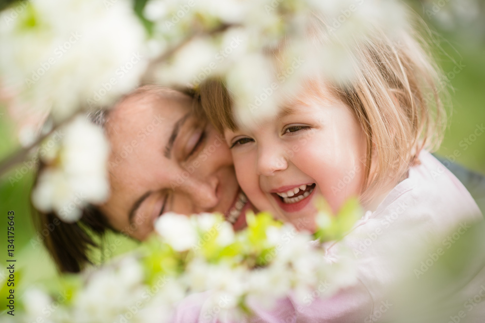 Fototapeta premium Mother hugging child