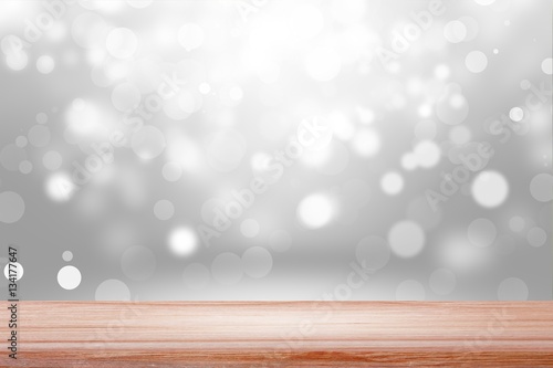 Empty wood table with backdrop blurred light blue bokeh background  Can be used for display your product