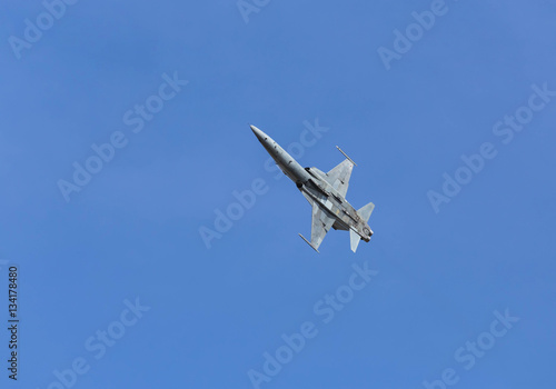 military fighter jet aircraft flying blue sky background