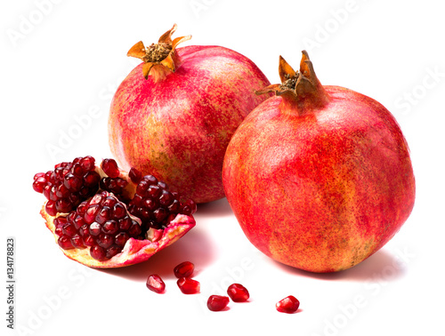 Pomegranate fruit isolated on white background. Slice.
