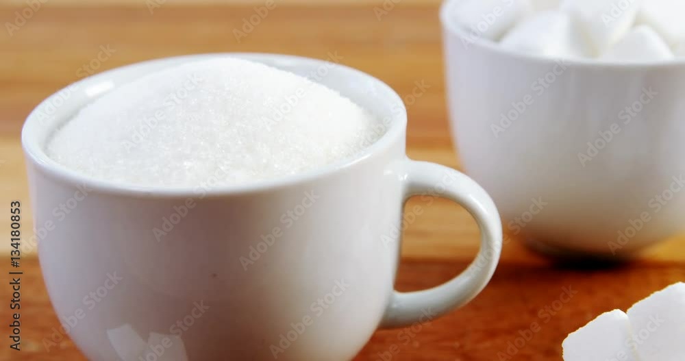 Cup of sugar powder and sugar cube Cup of sugar powder and sugar cube
