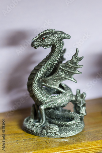 Foto Pewter figurine basilisk.