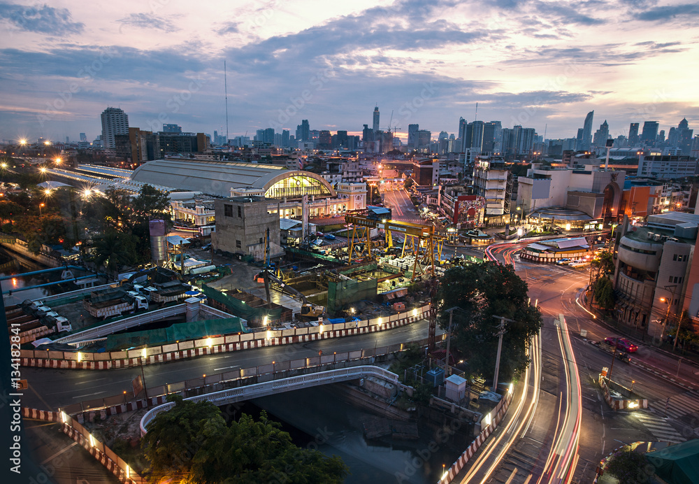 The aerial view of central Bangkok rail station in early morning, foreground is construction site.