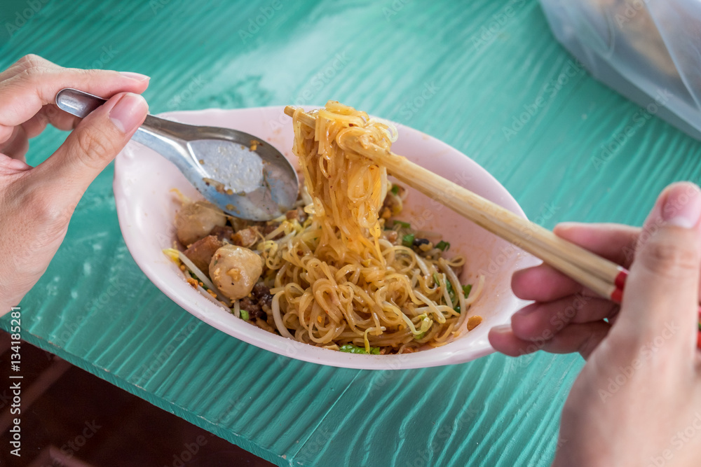 Thai beef noodle. Noodle with stewed beef, meat balls, and spicy