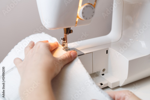 Photo of woman with sewing-machine