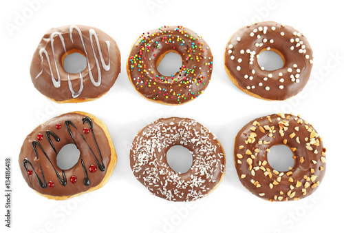 Tasty donuts on white background