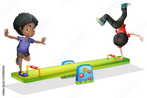 Boys playing on seesaw
