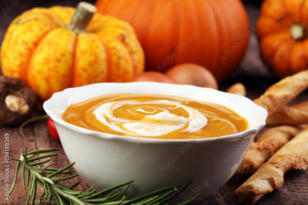 Pumpkin soup on a wooden table Pumpkin soup on a wooden table