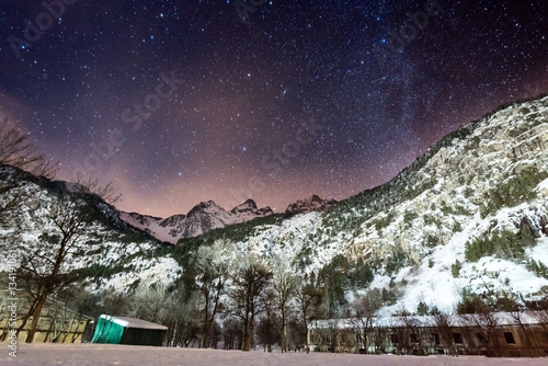 PANTICOSA, SPAIN - JUNE 19, 2017: A night view of the mountains and the shelter at Panticosa Baths, Tena Valley, Aragon, Spain photo