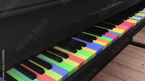 Piano with differntly colored keys on wooden floor