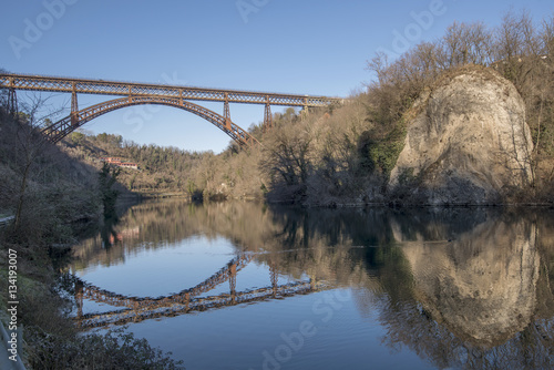 old iron bridge over Adda river at Paderno, Italy © hal_pand_108