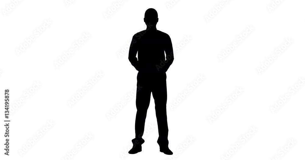 Silhouette of businessman standing with hands behind back Silhouette of businessman standing with hands behind back