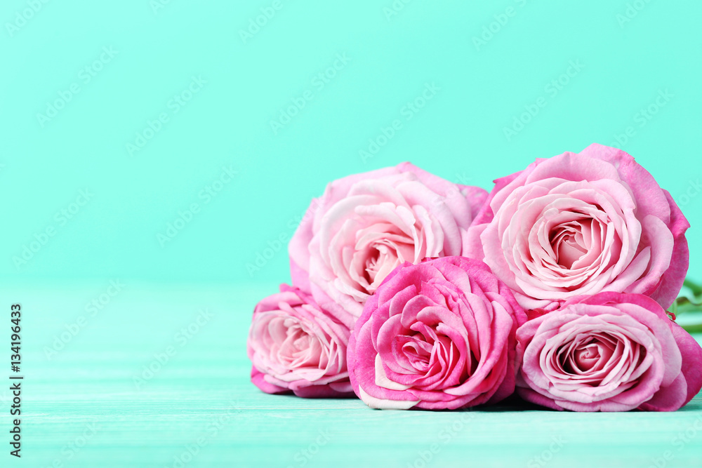 Bouquet of pink roses on a green background Bouquet of pink roses on a green background