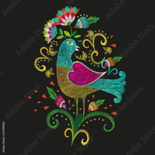 Embroidery colorful ethnic floral pattern. Vector traditional folk bird with flowers ornament on black background.