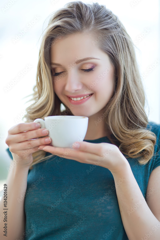 Beautiful woman drinking coffee Beautiful woman drinking coffee