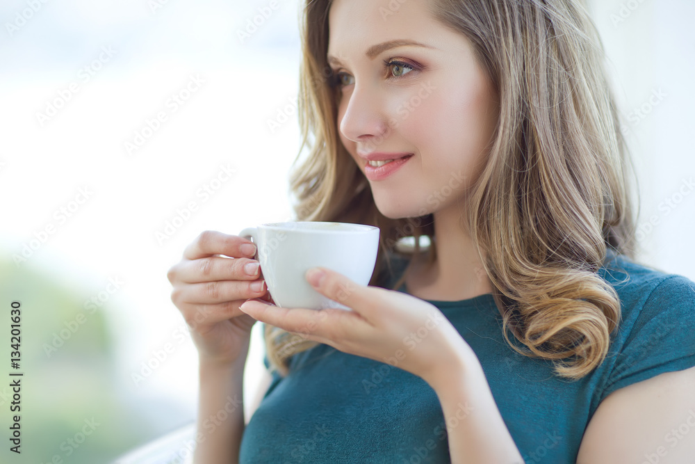 Beautiful woman drinking coffee Beautiful woman drinking coffee