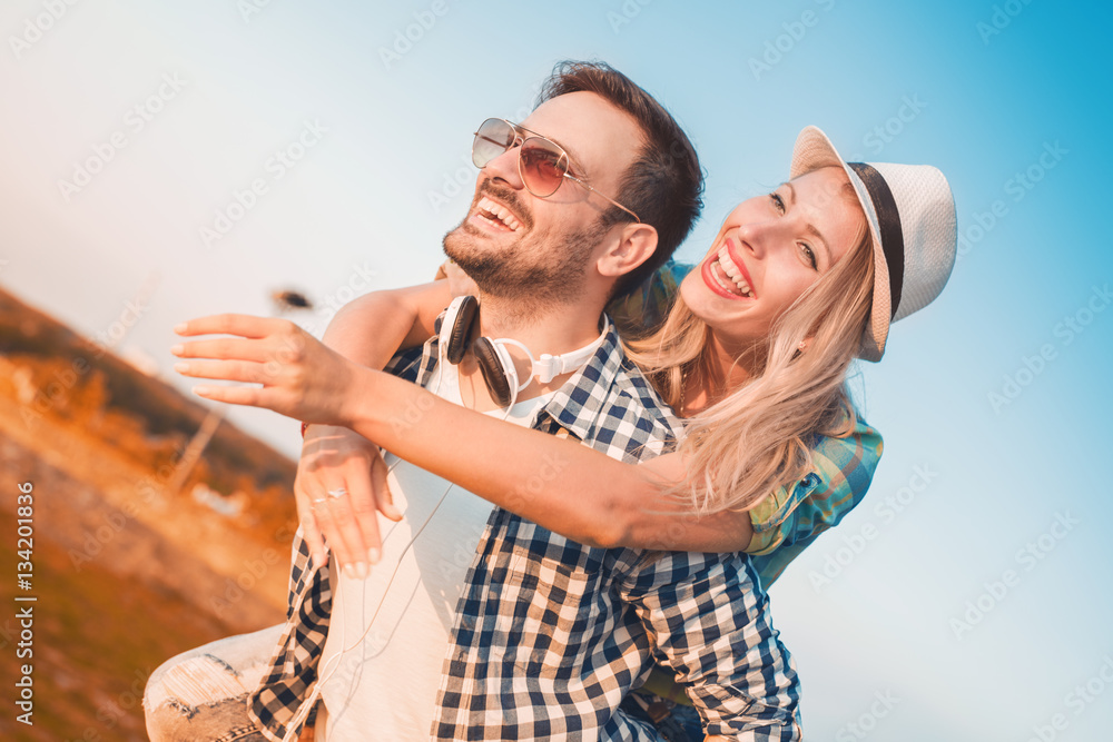 Smiling couple in love outdoors Smiling couple in love outdoors