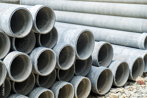 Stacked of Industrial concrete drainage pipes for construction