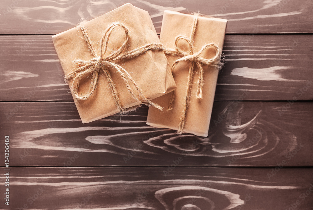 Two gift on the old wooden background Two gift on the old wooden background