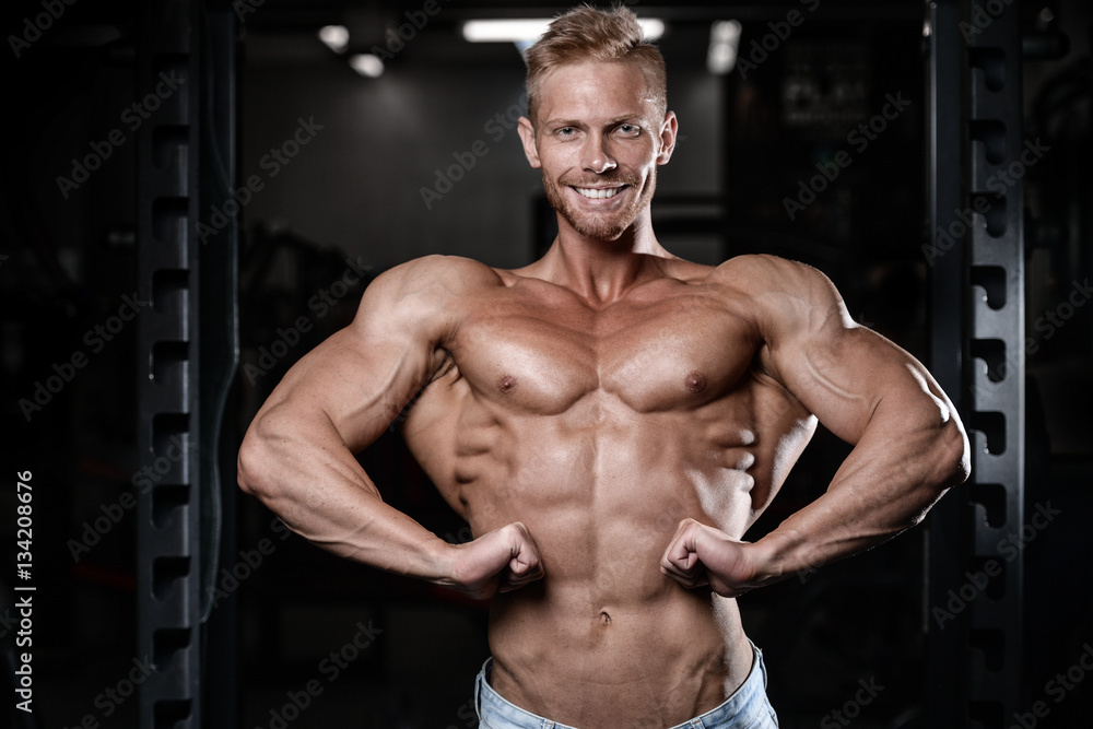 Strong and handsome athletic young man muscles abs and biceps. Strong and handsome athletic young man muscles abs and biceps.