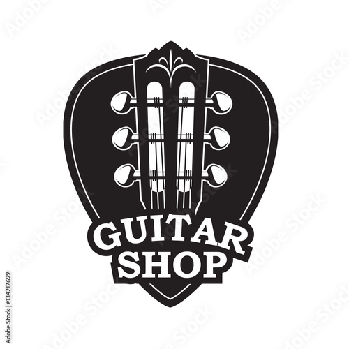abstract image of guitar neck with black pick