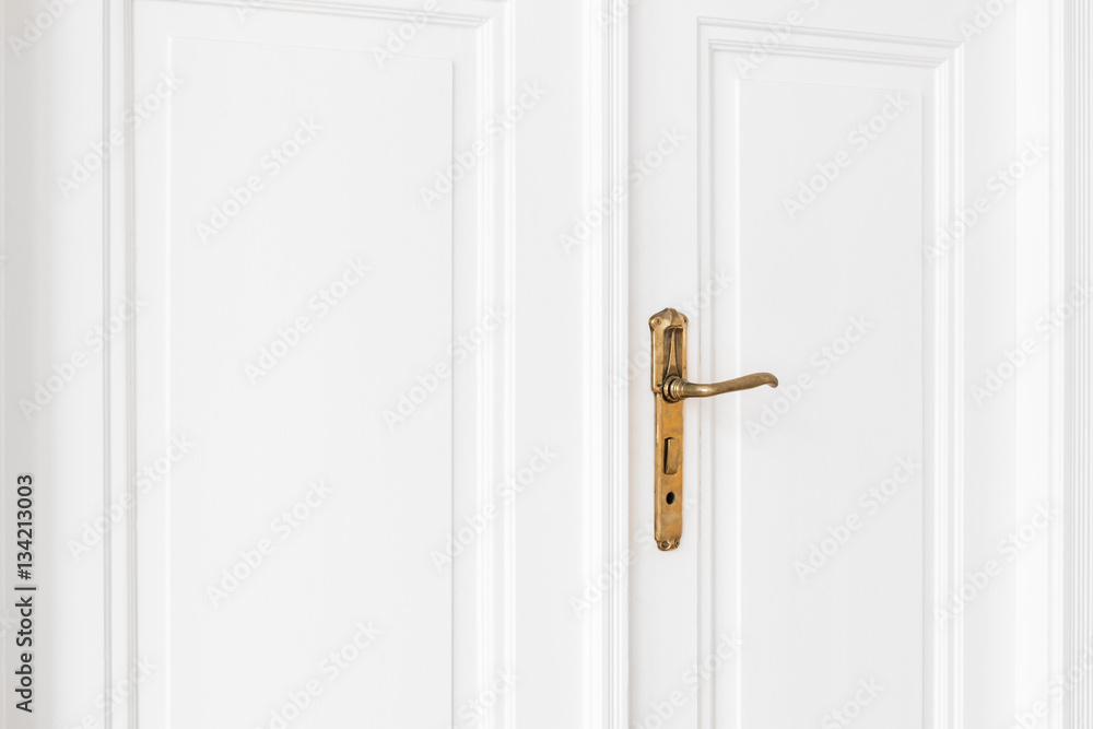 Obraz premium old door handle on white door