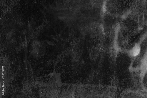 The texture of rusty iron. The rectangular background. Black and white photo. Grunge.